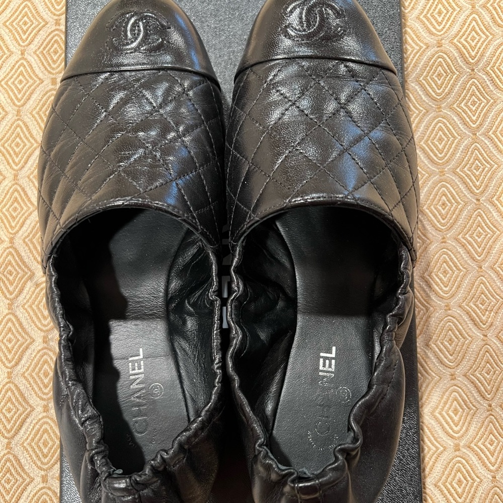 Chanel quilted black loafers